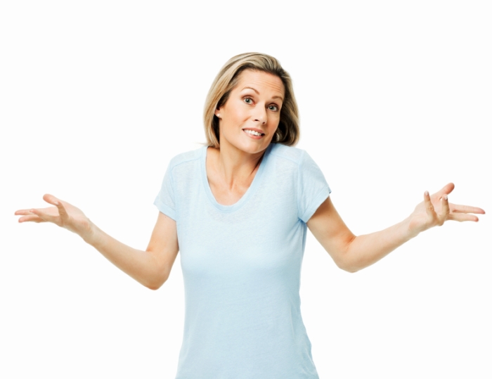 Woman Shrugging Her Shoulders - Isolated